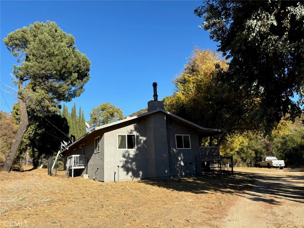 42930 Lake Hughes Road Lake Hughes, CA 93532 - Photo 37 of 54 a view of a house with a yard covered in snow