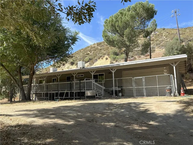 a house view with a outdoor space