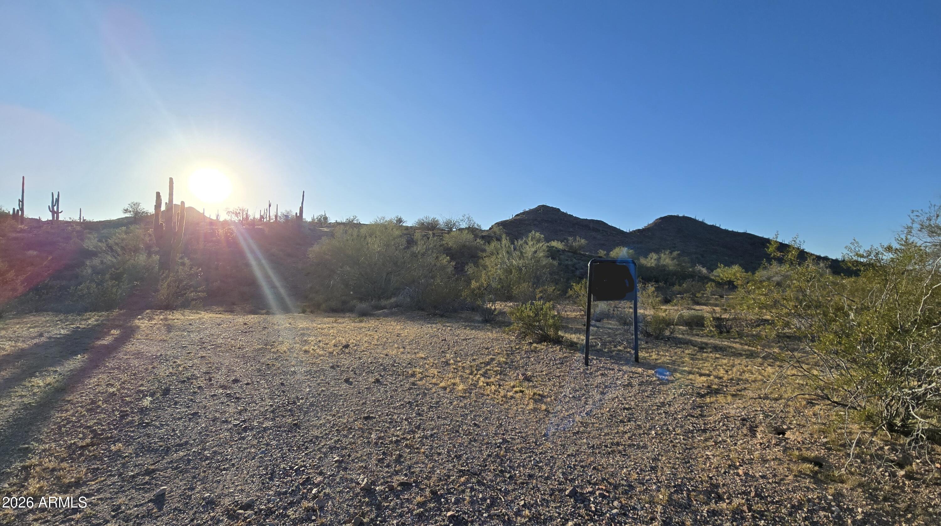 31275 West Cloud Road Wittmann, AZ 85361 - Photo 11 of 31 a view of a backyard of a house