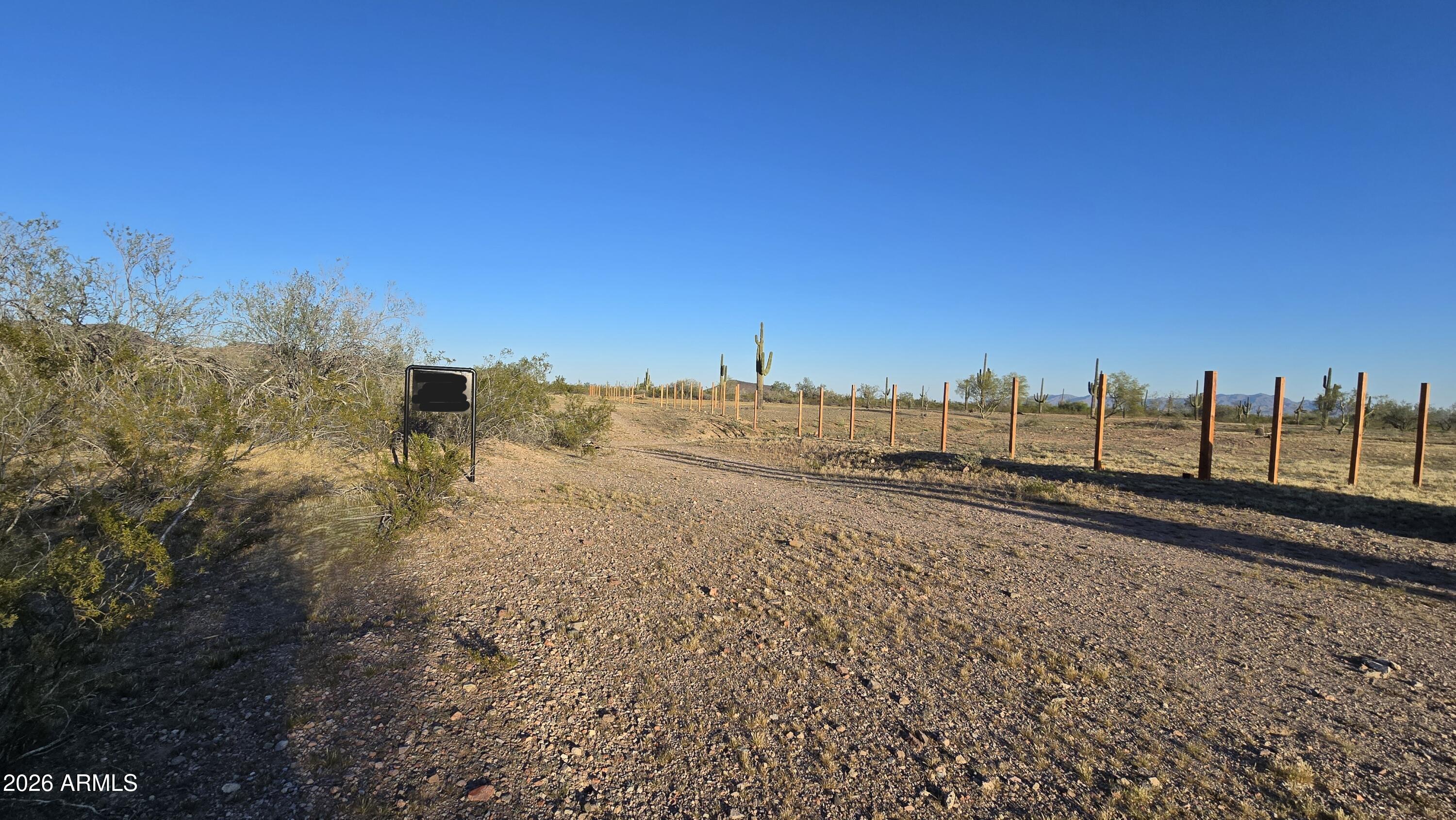 31275 West Cloud Road Wittmann, AZ 85361 - Photo 13 of 31 a view of a yard with an ocean view