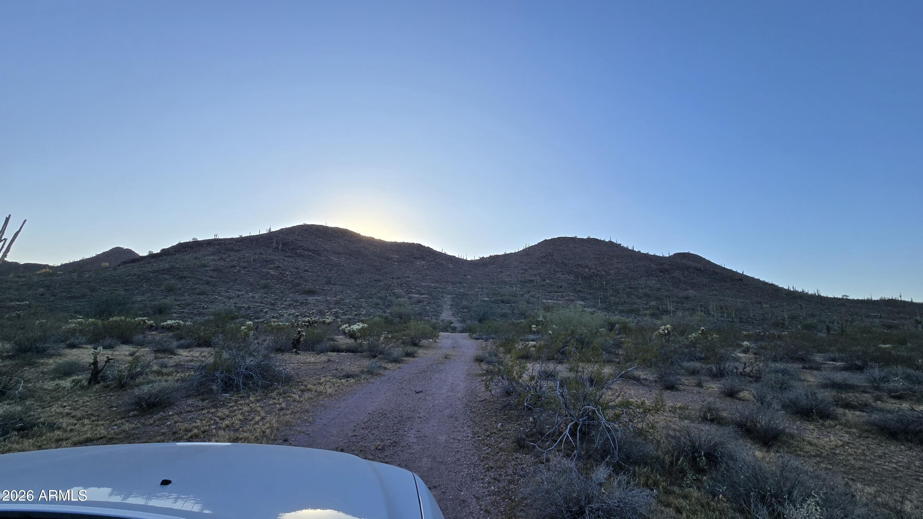 31275 West Cloud Road Wittmann, AZ 85361 - Photo 15 of 31 a view of a bathtub in a field