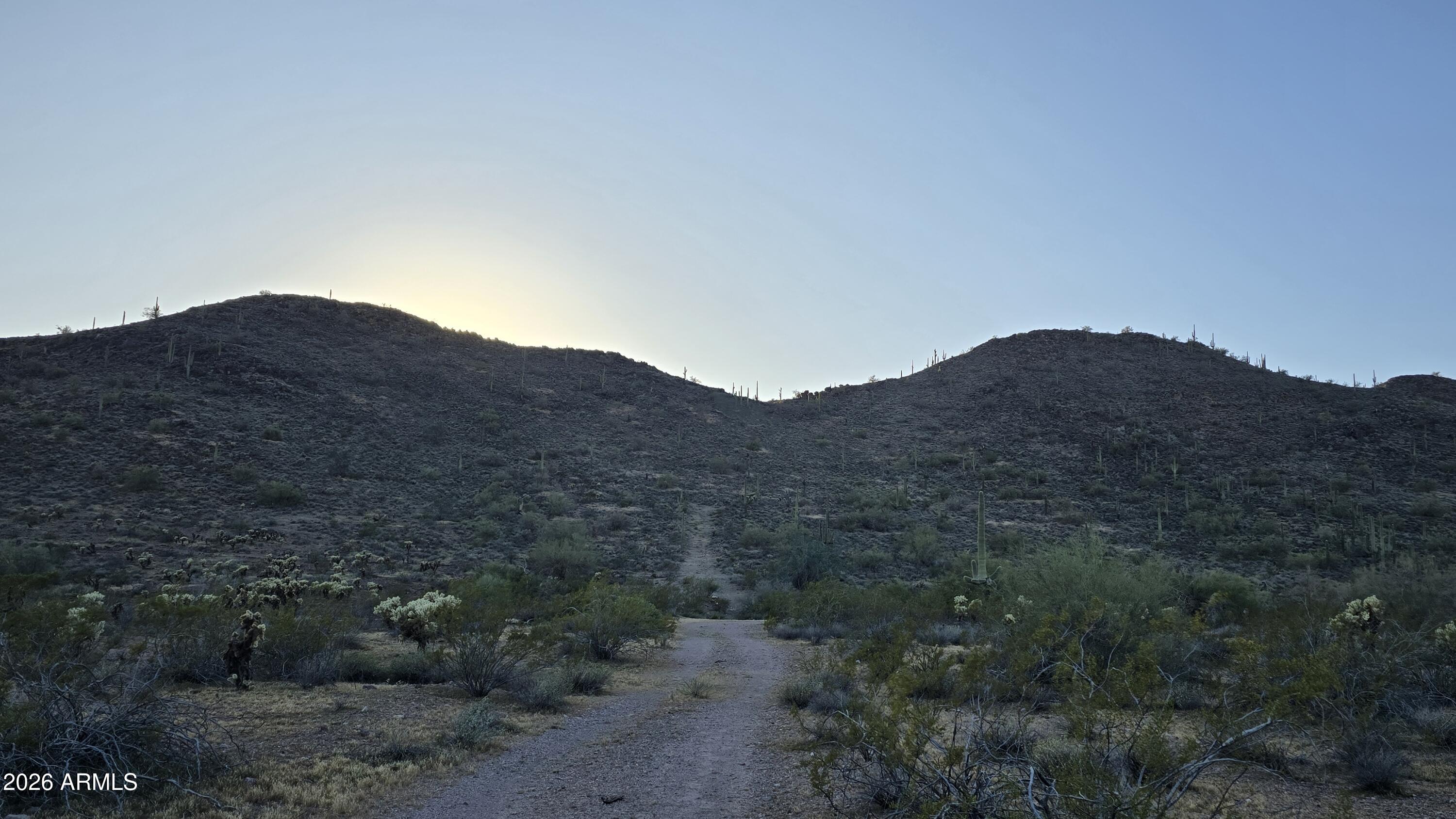 31275 West Cloud Road Wittmann, AZ 85361 - Photo 16 of 31 a view of a dry field