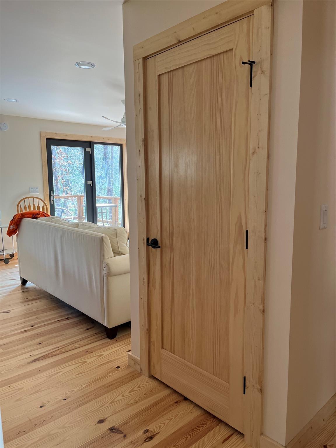 1252 Cardinal Road Brevard, NC 28712 - Photo 11 of 31 a living room with a bed and a window