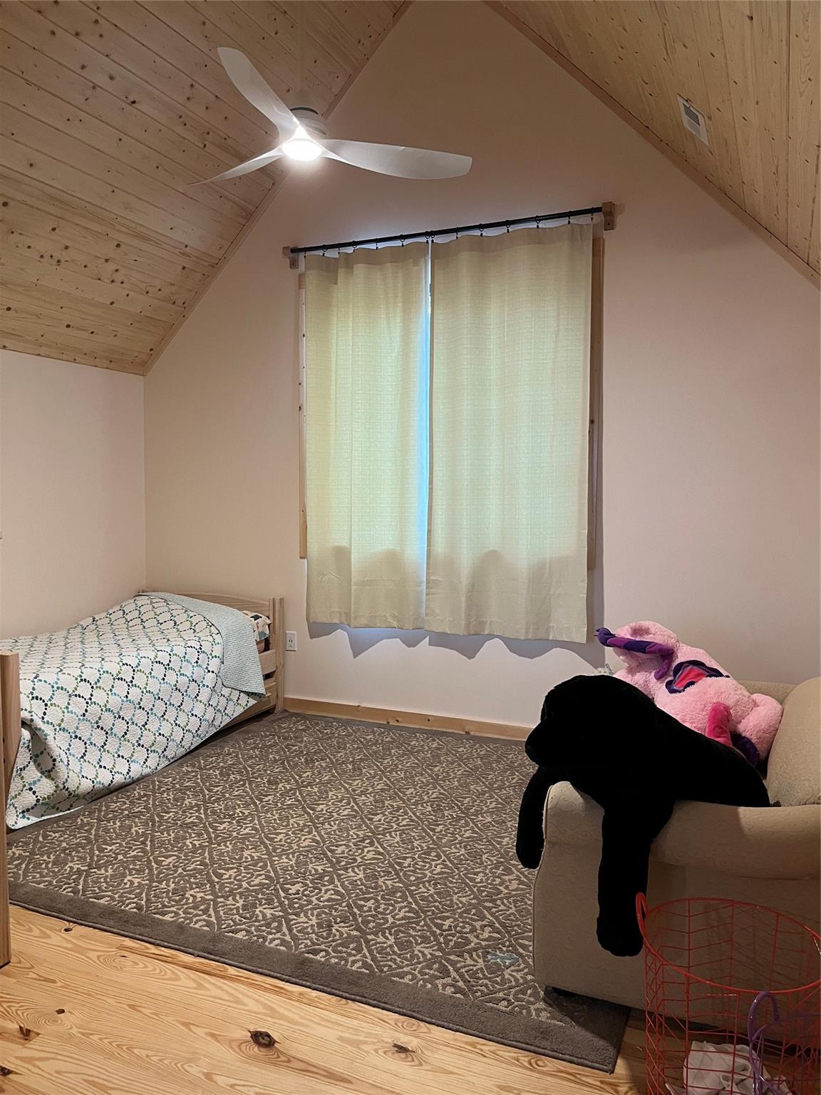 1252 Cardinal Road Brevard, NC 28712 - Photo 16 of 31 a bedroom with a bed and a window