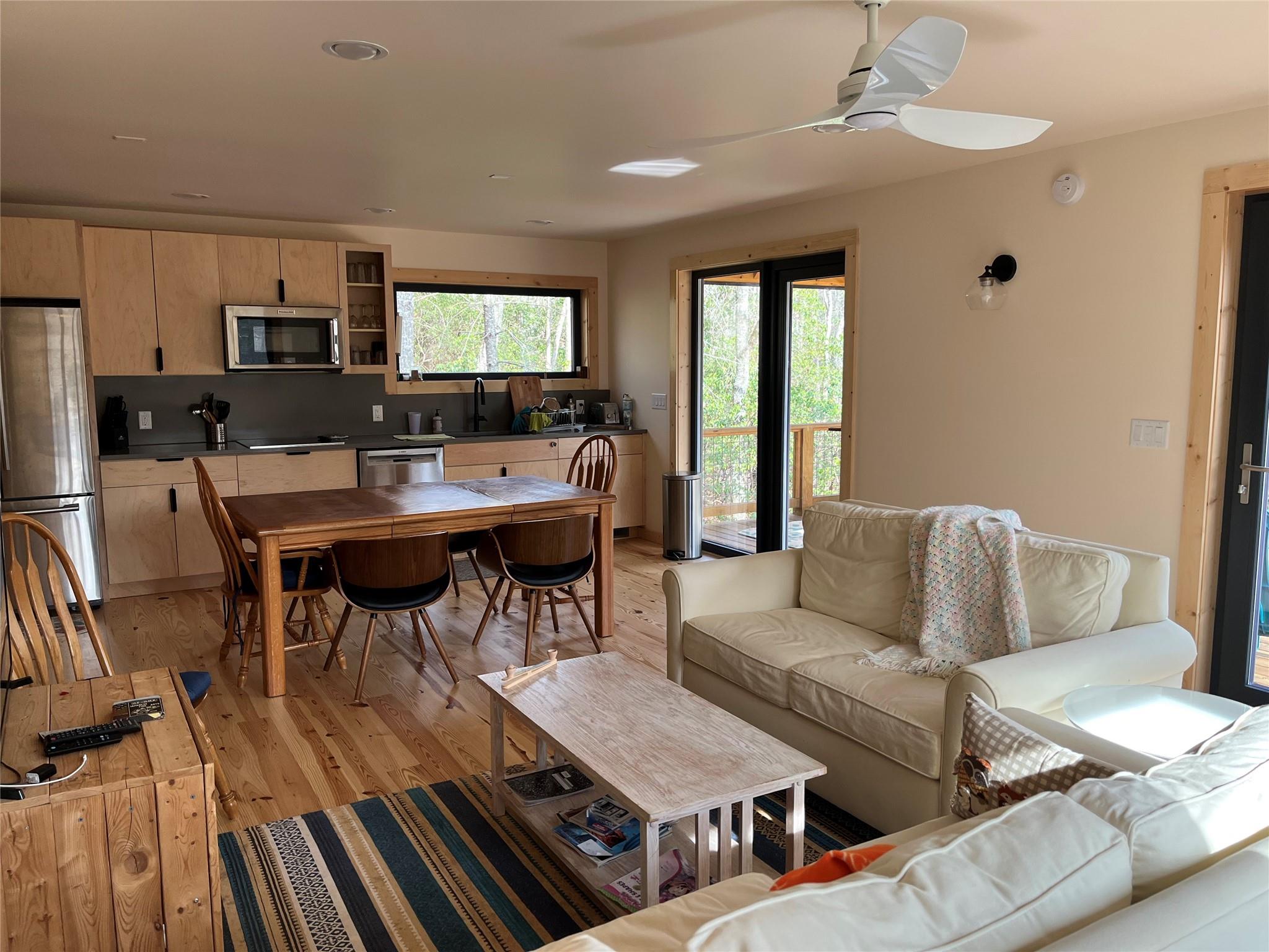 1252 Cardinal Road Brevard, NC 28712 - Photo 2 of 31 a living room with furniture and a flat screen tv