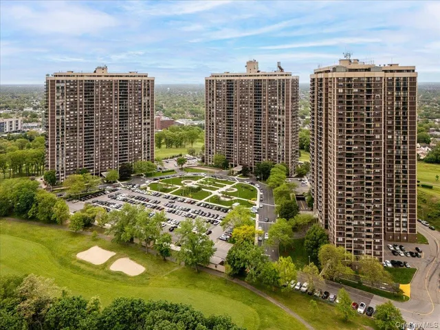 a view of a city with tall buildings