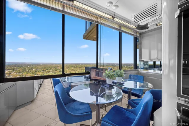 a bathroom with a sink and a refrigerator
