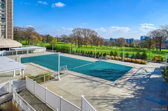 a childrens park with lots of swings and slides