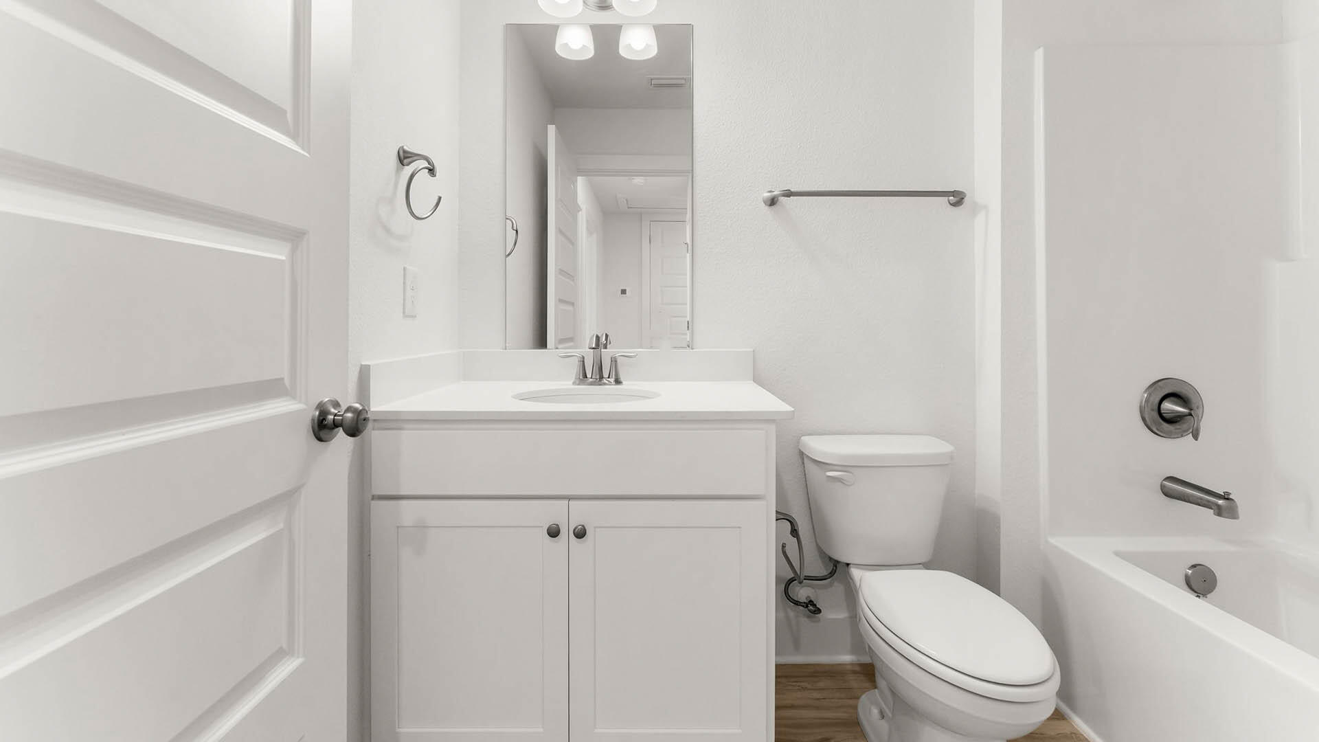123 Hawk Street Santa Rosa Beach, FL 32459 - Photo 29 of 31 a bathroom with a sink a toilet and shower