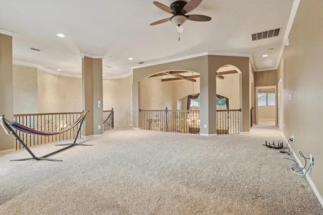a view of a hallway with a livingroom