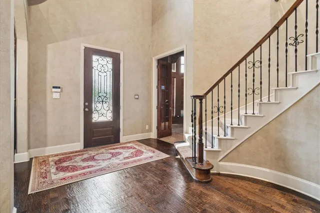 a view of entryway with wooden floor