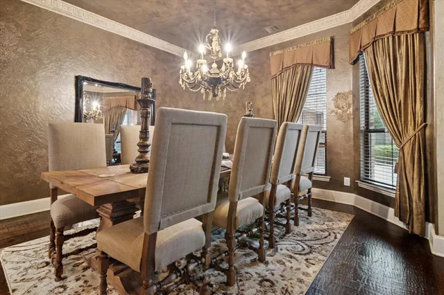 a workspace with furniture window and wooden floor