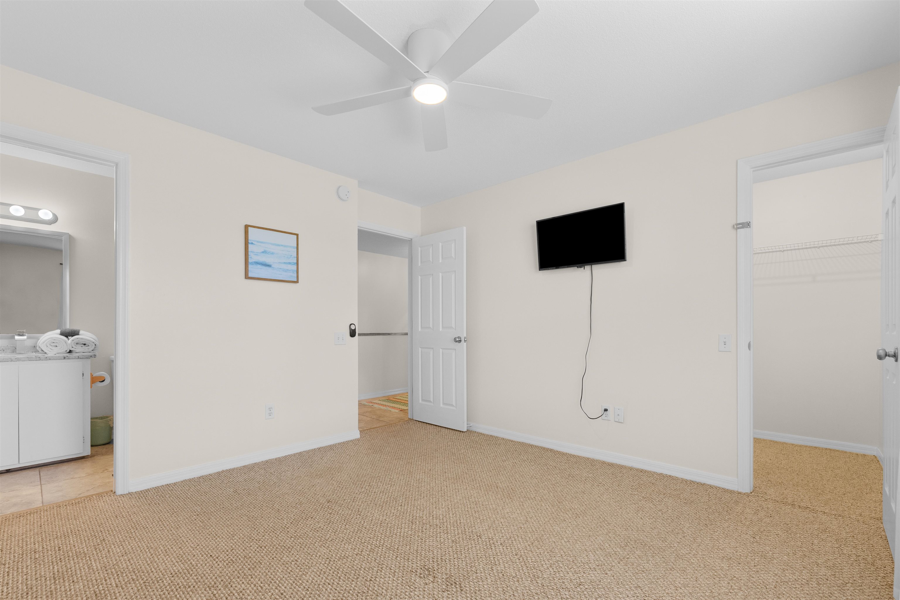 109 B Street, Unit D St. Augustine Beach, FL 32080 - Photo 15 of 29 an empty room with windows and closet