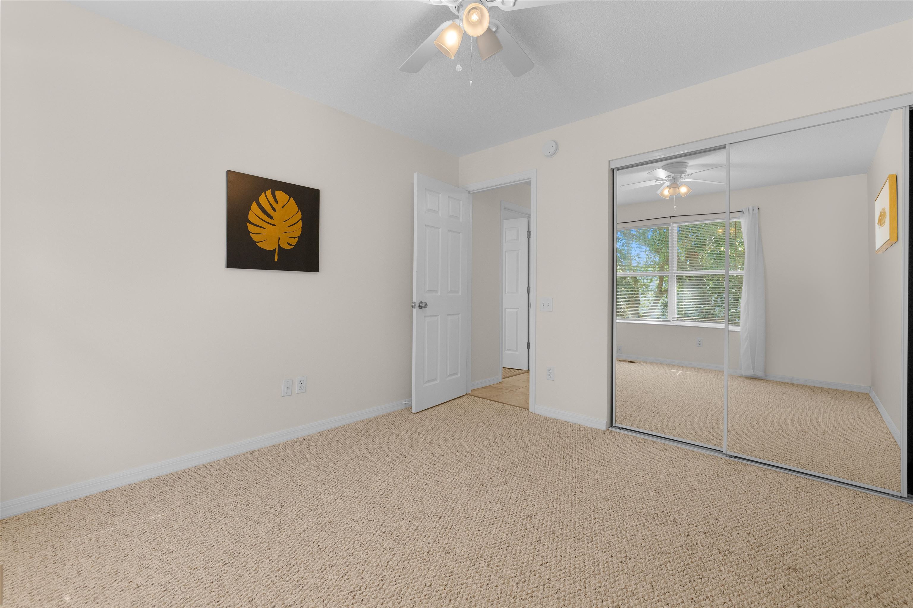 109 B Street, Unit D St. Augustine Beach, FL 32080 - Photo 18 of 29 a view of an empty room with a window