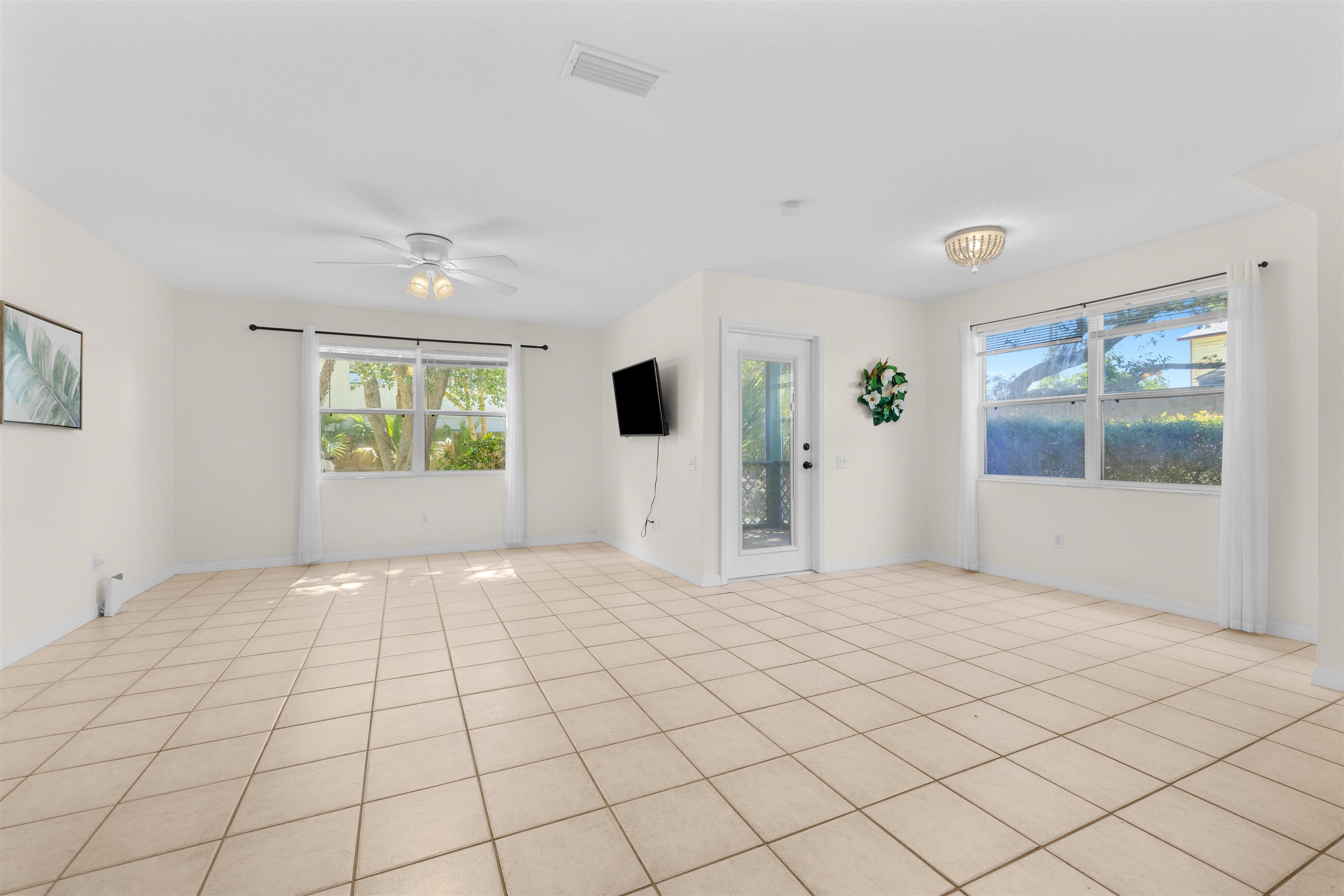 109 B Street, Unit D St. Augustine Beach, FL 32080 - Photo 8 of 29 a view of an empty room with a window