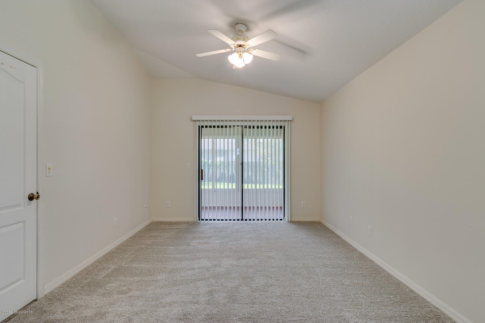 1336 Sapulpa Road Southwest Palm Bay, FL 32908 - Photo 12 of 25 a view of an empty room with a window