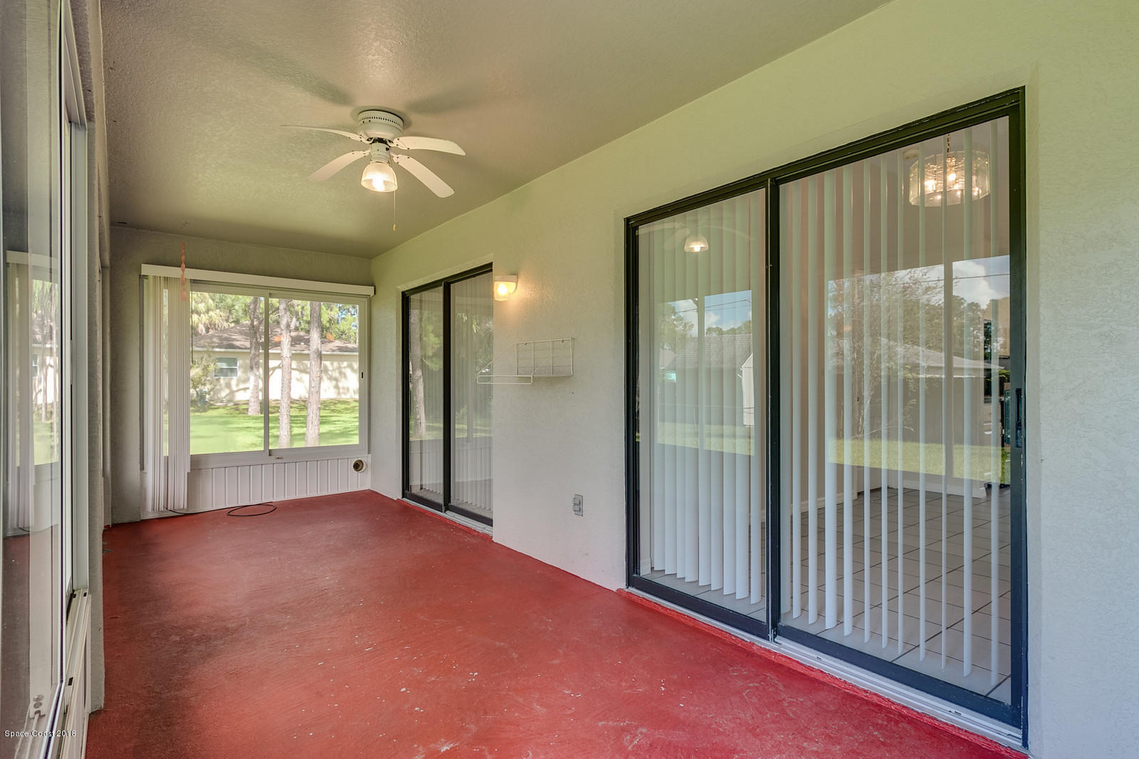 1336 Sapulpa Road Southwest Palm Bay, FL 32908 - Photo 20 of 25 a view of livingroom with an outdoor space and balcony