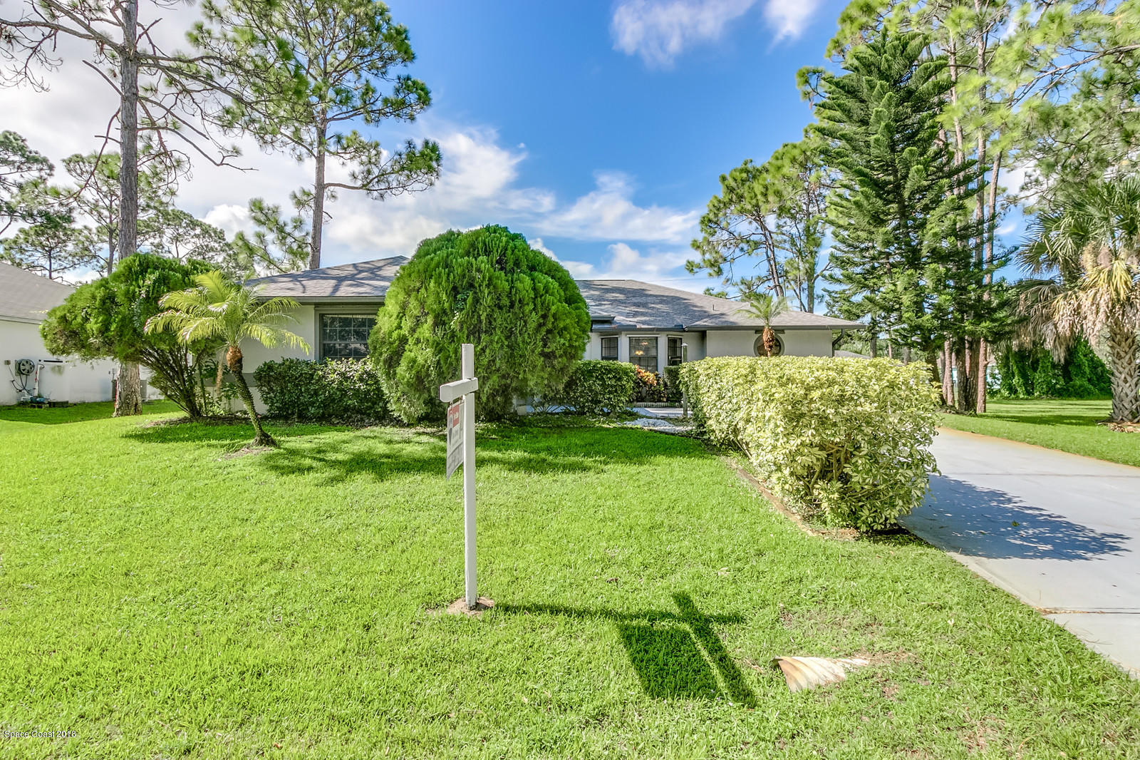 1336 Sapulpa Road Southwest Palm Bay, FL 32908 - Photo 24 of 25 a view of a house with a backyard