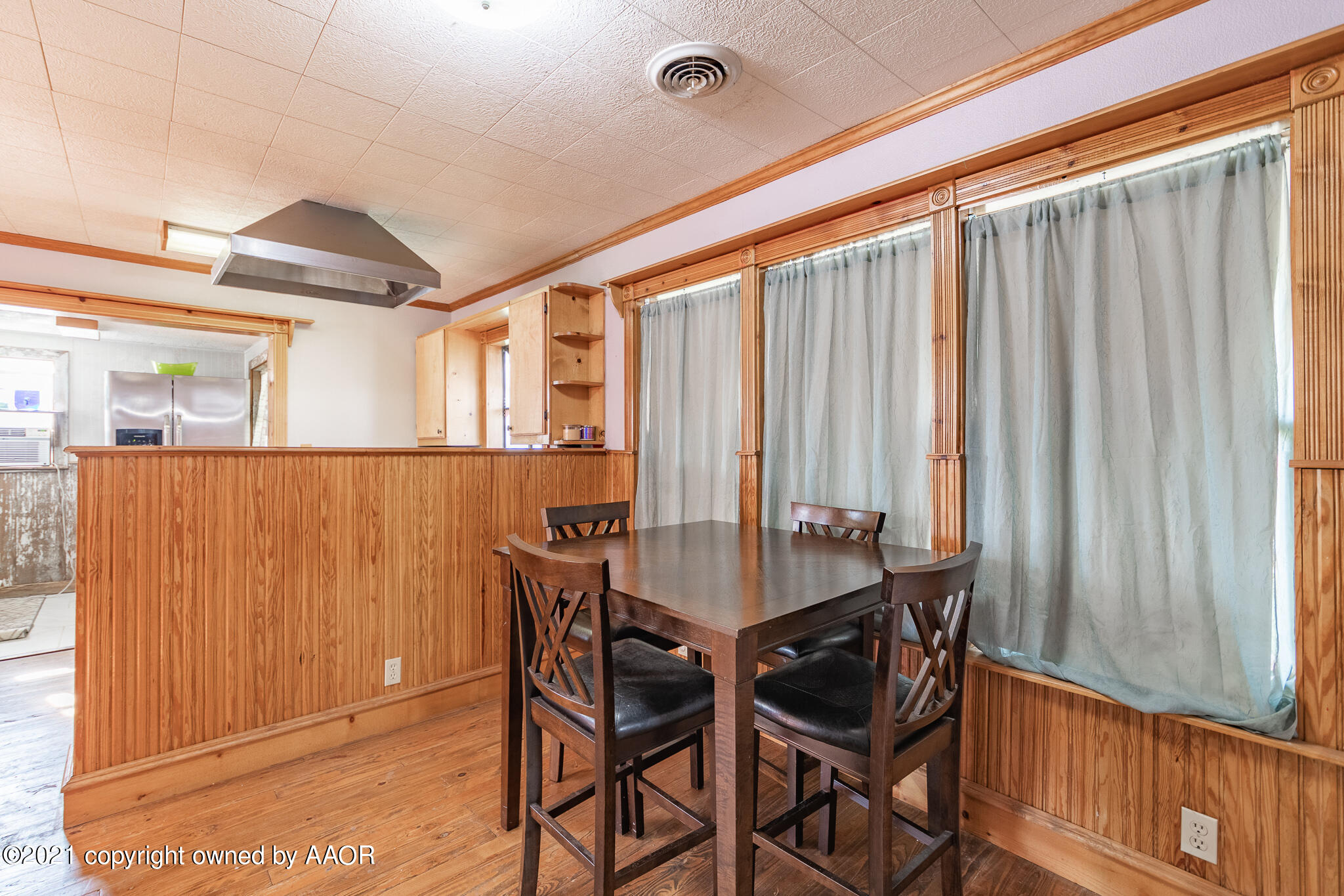 105 Southwest 41st Avenue Amarillo, TX 79110 - Photo 12 of 27 a dining room with furniture and window