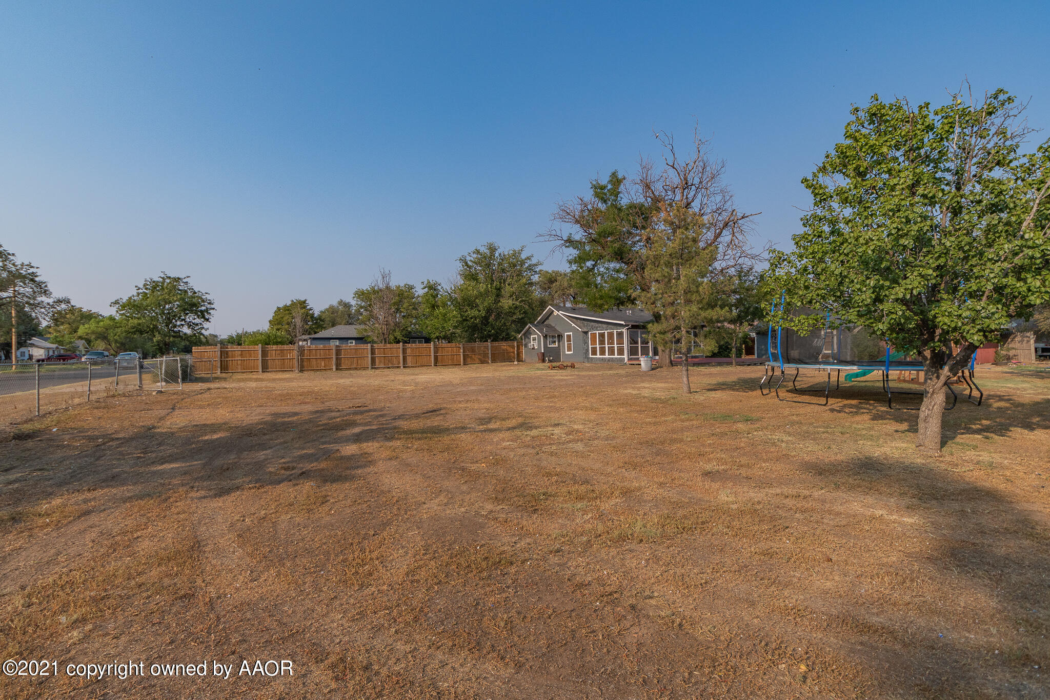 105 Southwest 41st Avenue Amarillo, TX 79110 - Photo 24 of 27 a view of backyard with trees