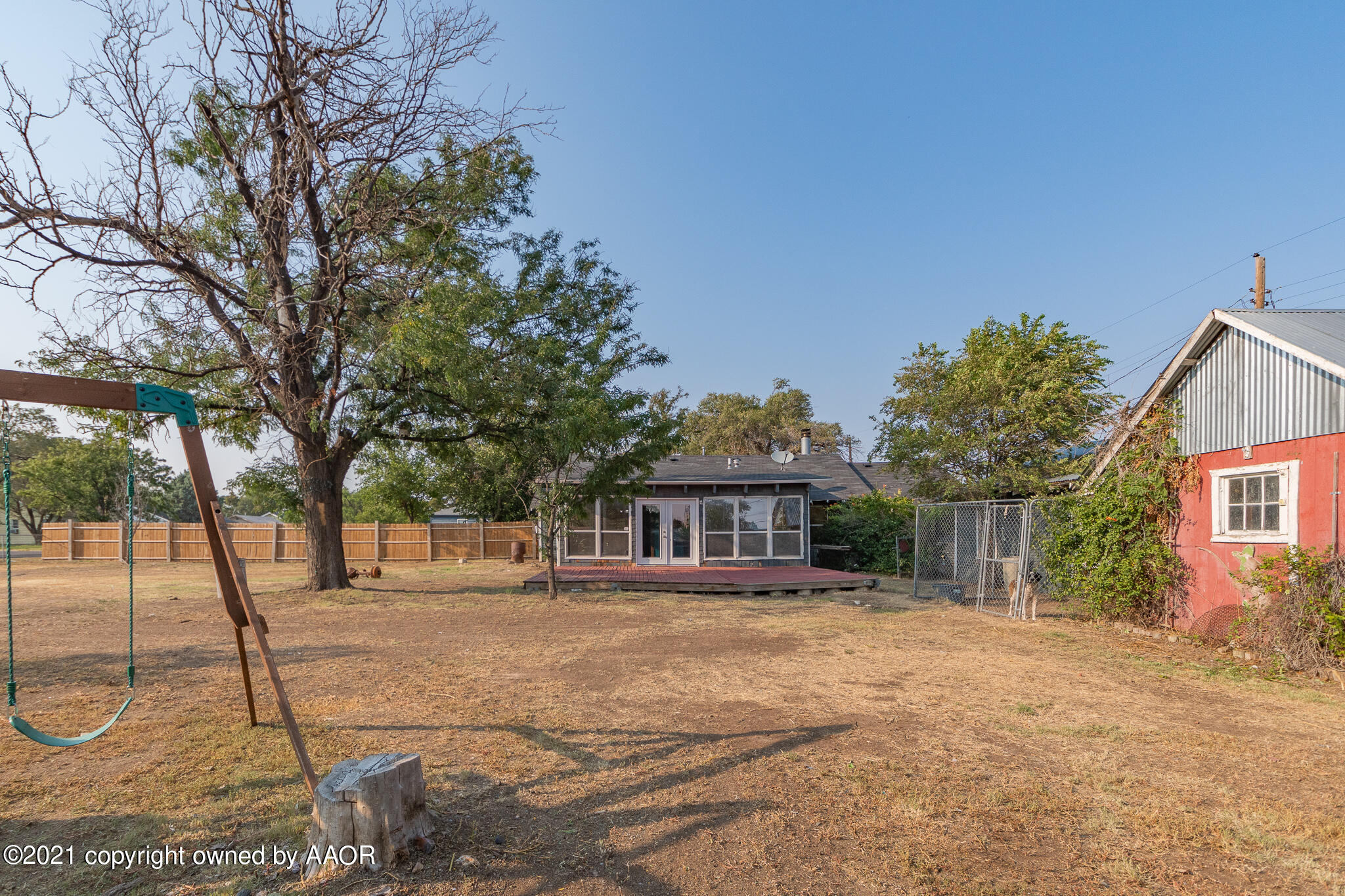 105 Southwest 41st Avenue Amarillo, TX 79110 - Photo 25 of 27 a house with trees in front of it
