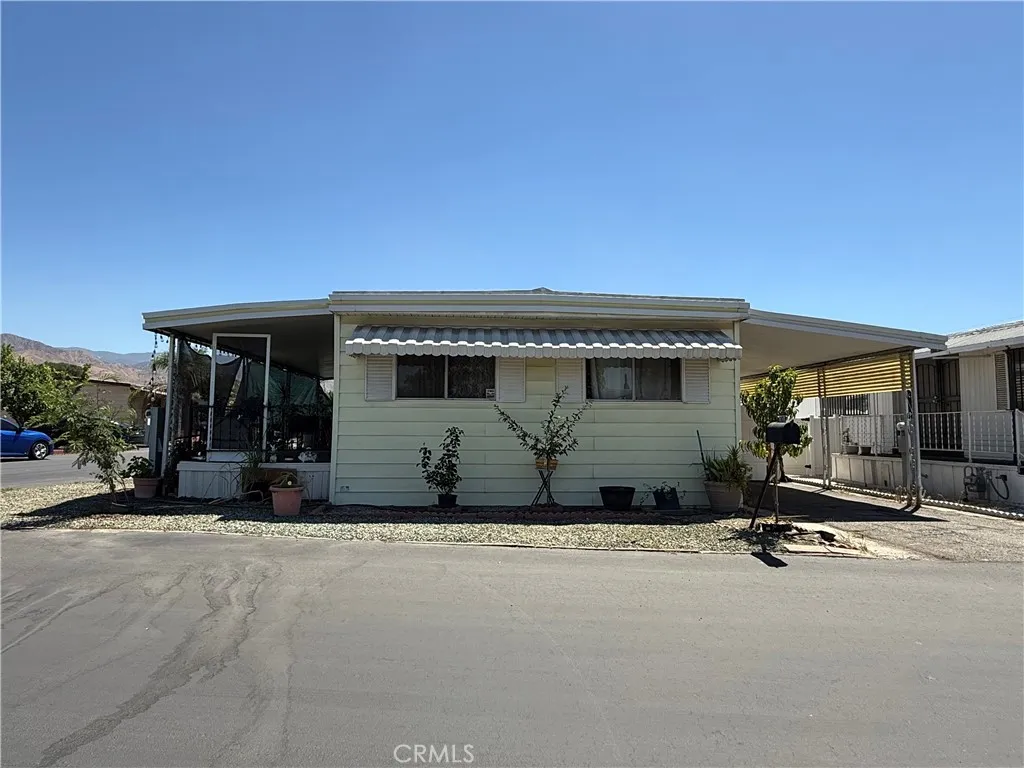 1315 Marshall Street East, Unit 87 San Bernardino, CA 92404 - Photo 1 of 1 a view of a house with sitting area
