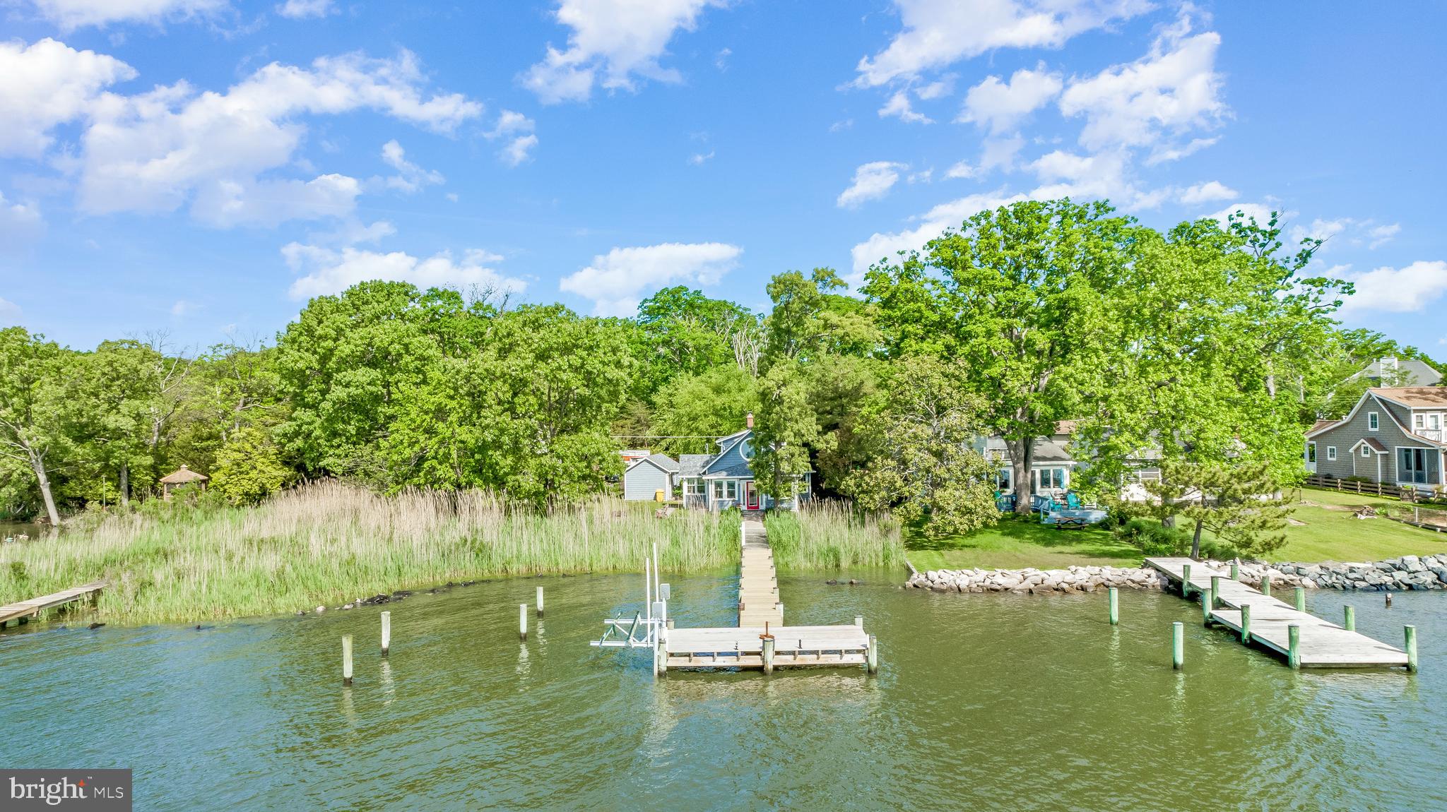 4749 Oak Road Shady Side, MD 20764 - Photo 17 of 51 Stunning view of the dock, property, and home.