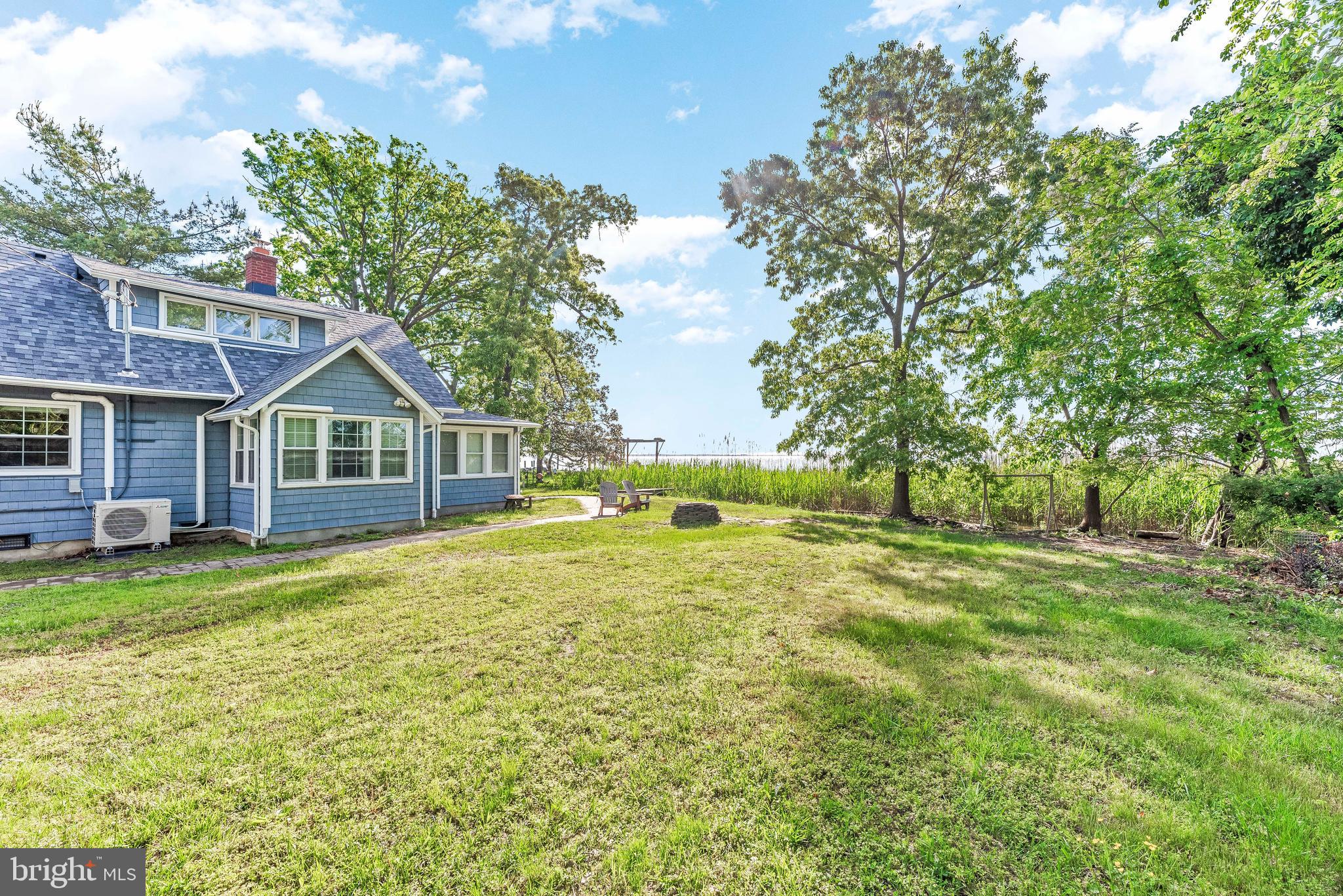 4749 Oak Road Shady Side, MD 20764 - Photo 7 of 51 Lovely lush property as you walk around the home.