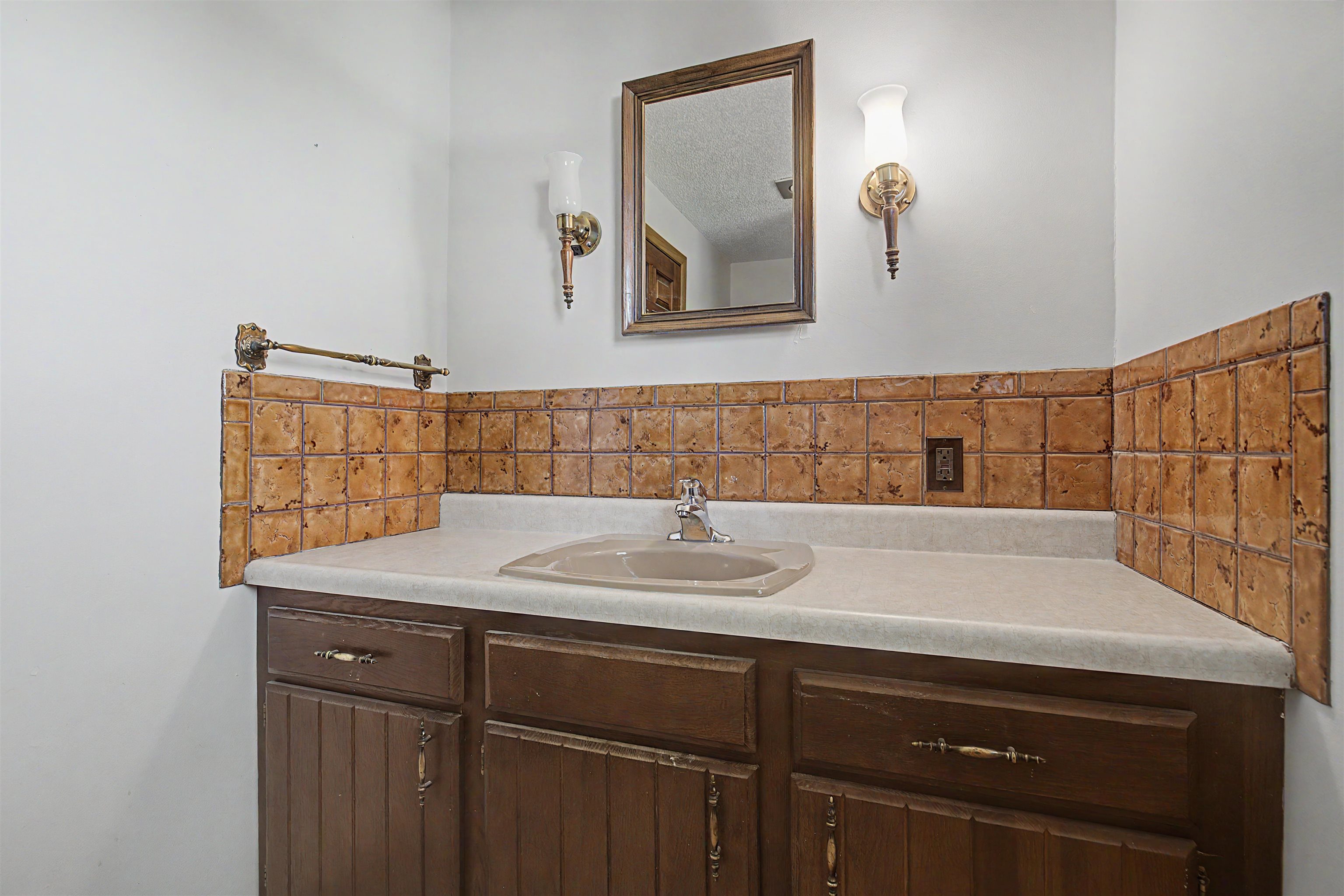 17380 Corbett Road Mount Carroll, IL 61053 - Photo 42 of 65 a bathroom with a sink and a mirror