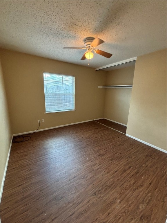2119 Westwind Circle, Unit 2 Ingleside, TX 78362 - Photo 11 of 16 an empty room with wooden floor and windows