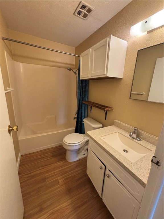 2119 Westwind Circle, Unit 2 Ingleside, TX 78362 - Photo 13 of 16 a bathroom with a sink a toilet and shower