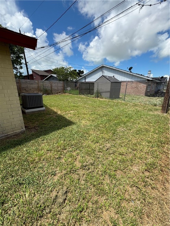 2119 Westwind Circle, Unit 2 Ingleside, TX 78362 - Photo 16 of 16 a front view of a house with a yard