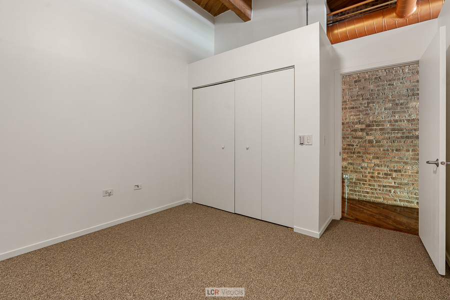 1040 West Adams Street, Unit 247 Chicago, IL 60607 - Photo 11 of 20 a view of an empty room