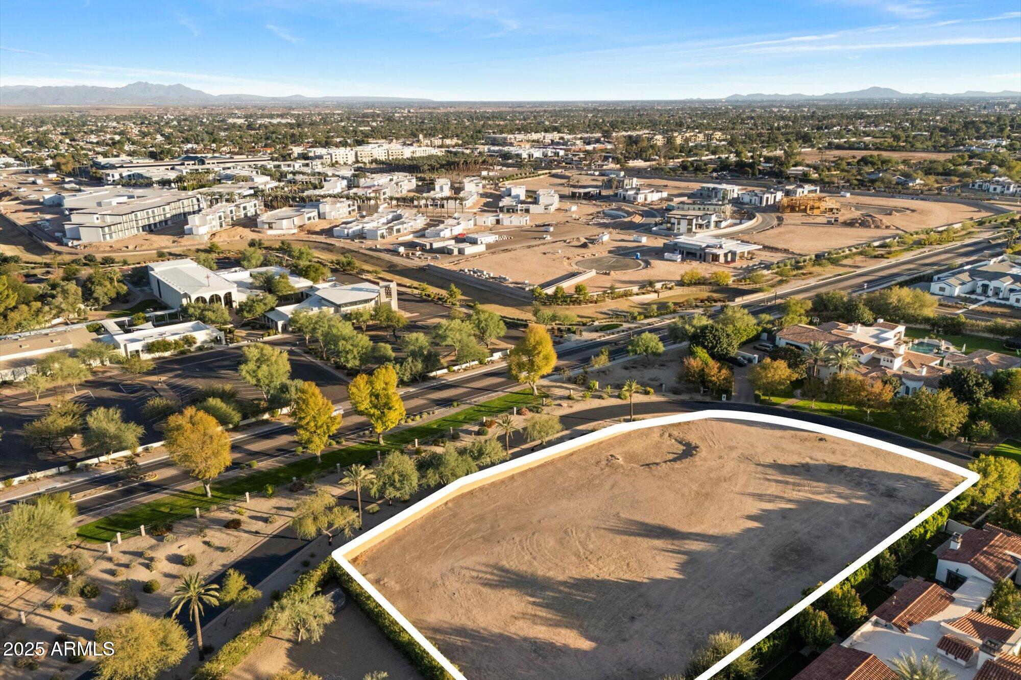 6700 East Cactus Wren Road, Unit 30 Paradise Valley, AZ 85253 - Photo 17 of 32 an aerial view of residential houses with outdoor space