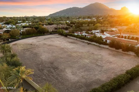 a view of a city with mountains in the background