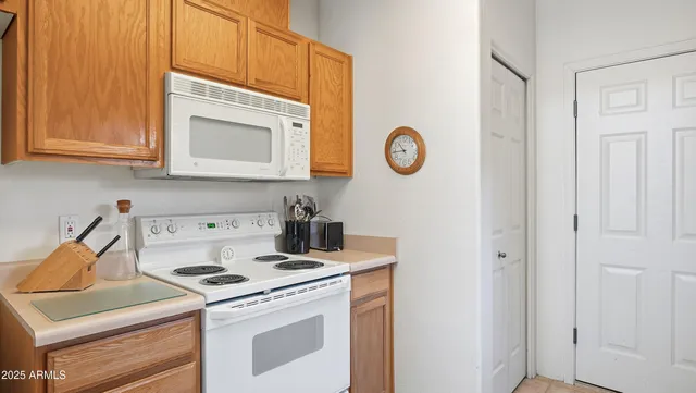 a kitchen with a sink and a window