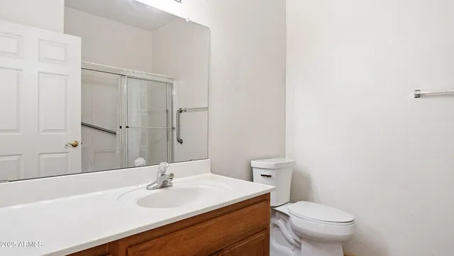 a view of hallway with walk in closet