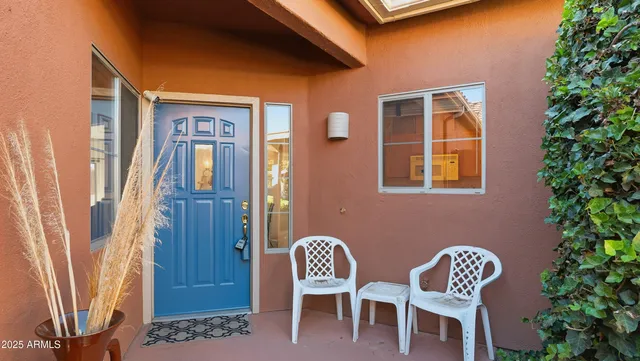 a kitchen with a sink cabinets and a refrigerator