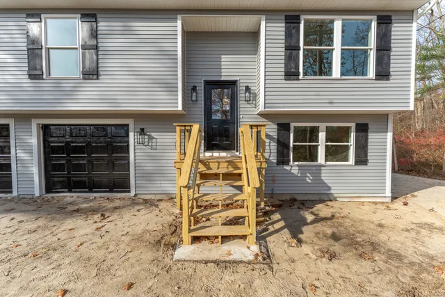 a view of a house with wooden door