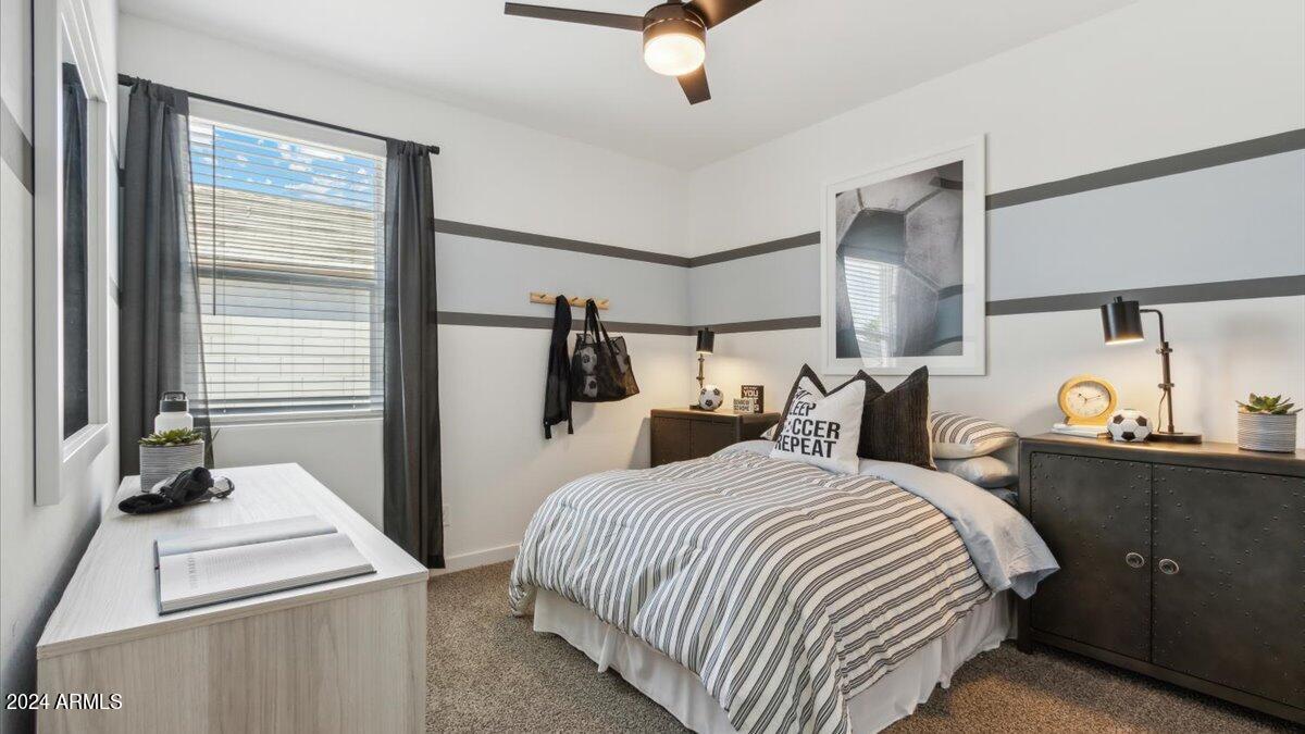 1126 South Mulberry Street Florence, AZ 85132 - Photo 14 of 21 a bedroom with bed and window