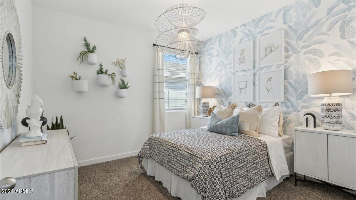 1126 South Mulberry Street Florence, AZ 85132 - Photo 15 of 21 a bedroom with a bed and a sink