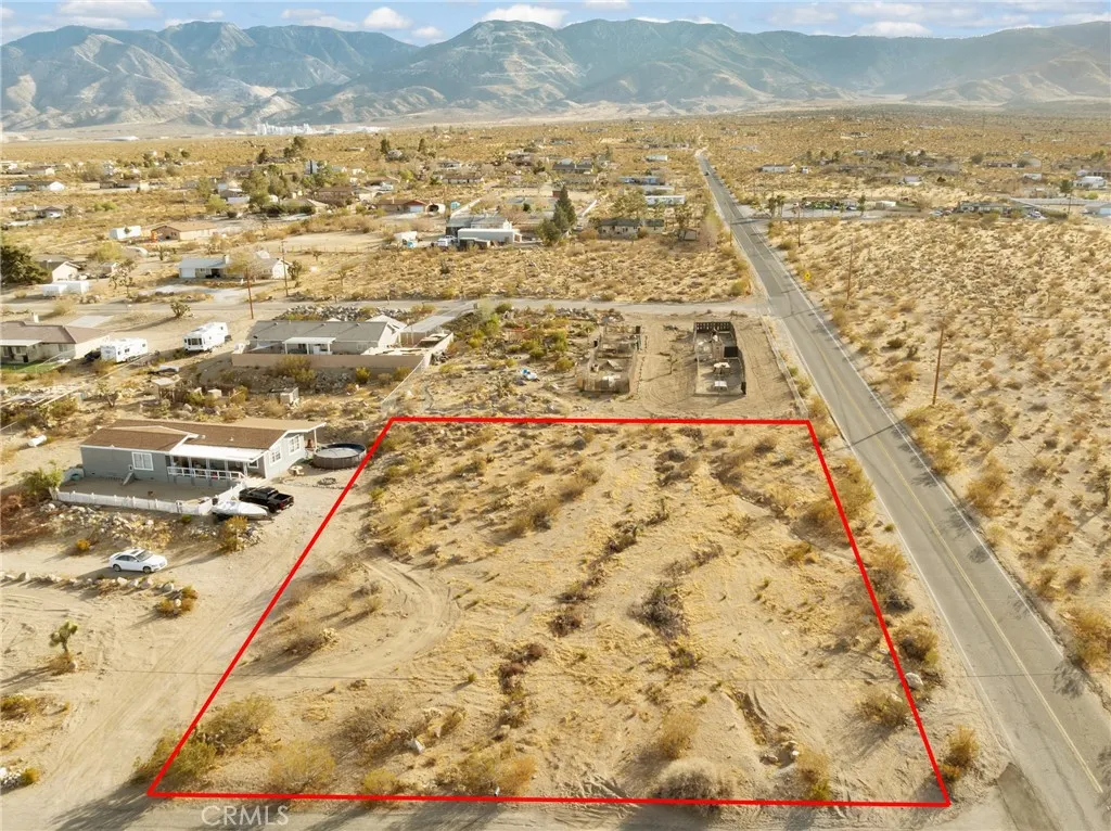 721 Zircon Road Lucerne Valley, CA 92356 - Photo 2 of 7 Red boundary lines on pictures are an estimate and for marketing purposes only. Buyer to verify all aspects of this property including, but not limited to utilities, assessments, boundaries, usage, access, and zoning to satisfy themselves.