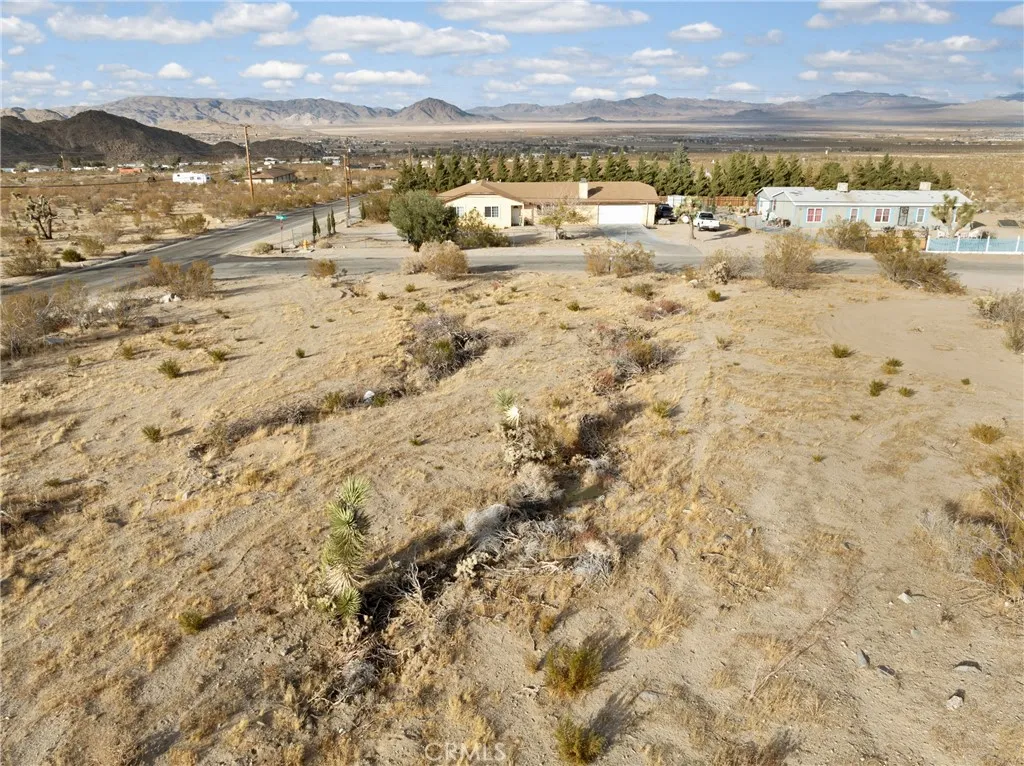 721 Zircon Road Lucerne Valley, CA 92356 - Photo 6 of 7 Red boundary lines on pictures are an estimate and for marketing purposes only. Buyer to verify all aspects of this property including, but not limited to utilities, assessments, boundaries, usage, access, and zoning to satisfy themselves.