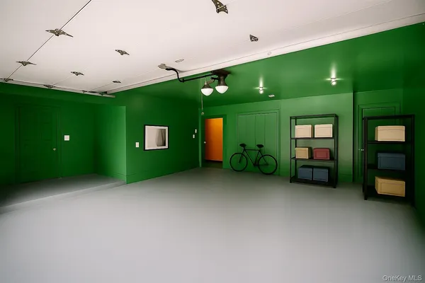 a view of a livingroom with a fireplace and a projector
