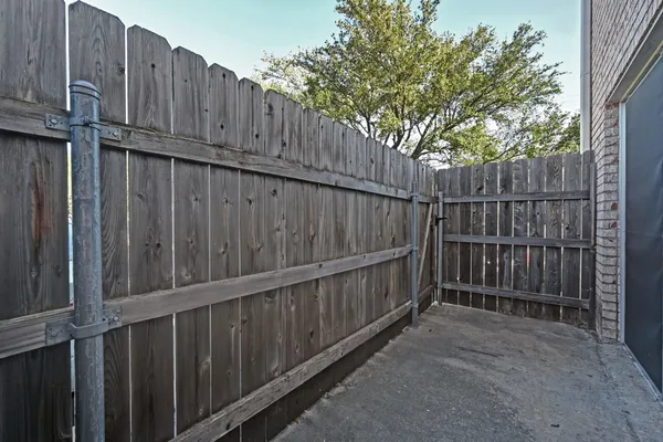 a view of a wooden fence