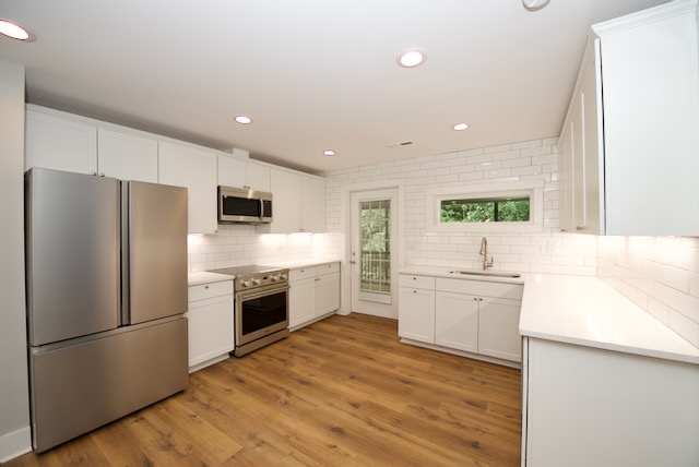 317 Pendleton Road Clemson, SC 29631 - Photo 15 of 36 A well-appointed kitchen showcasing contemporary finishes and stainless steel appliances.