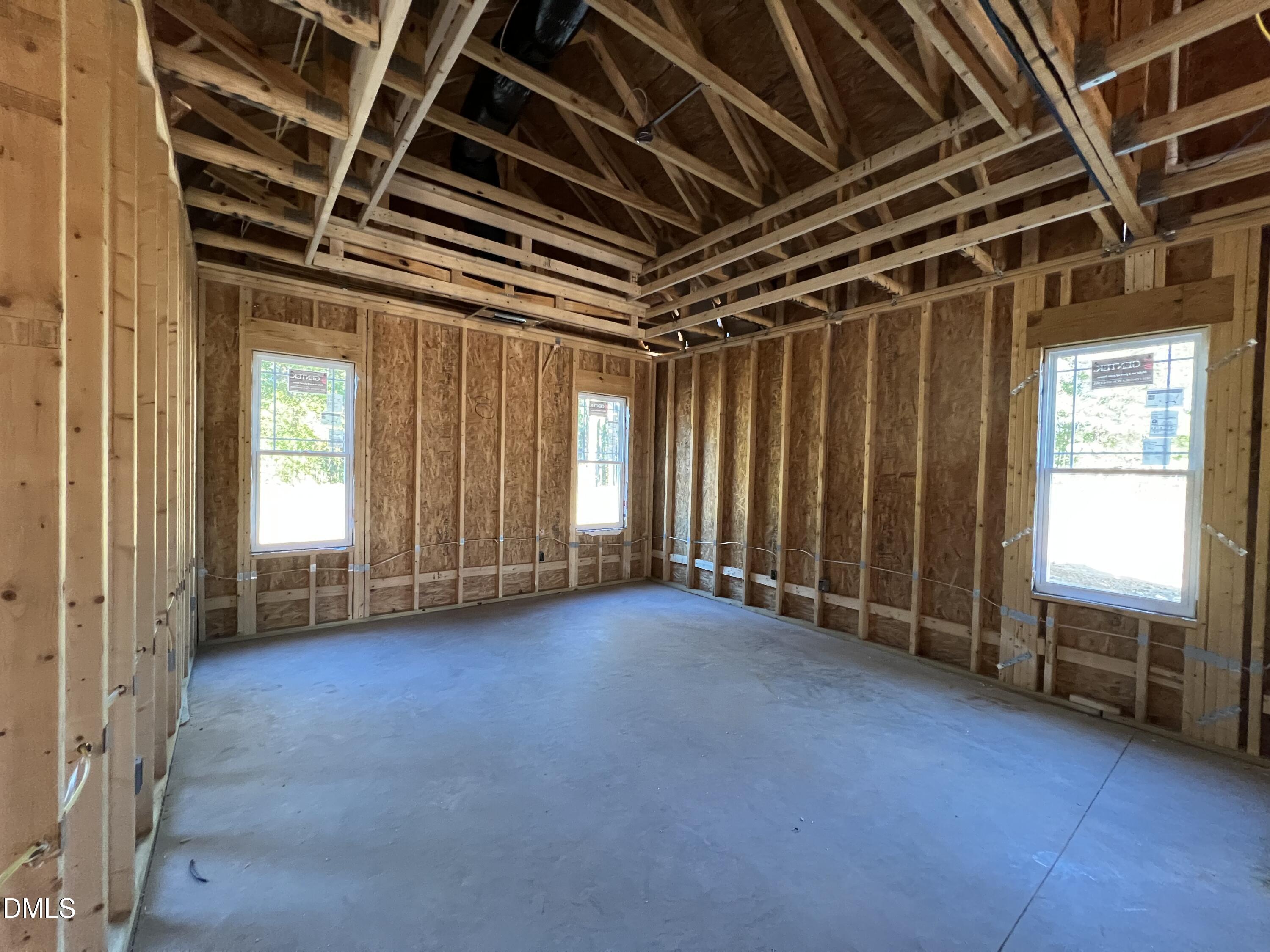 16 Alex Acres Way Selma, NC 27576 - Photo 4 of 6 a view of an empty room with a window