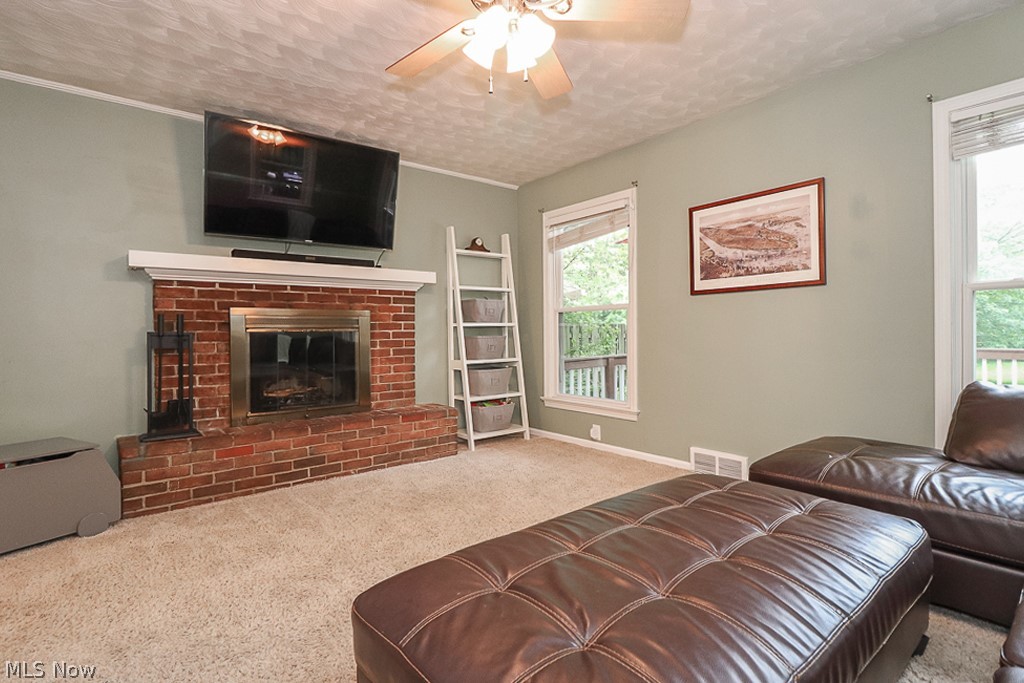 5214 East Farnhurst Road Cleveland, OH 44124 - Photo 6 of 32 Family room with brick, wood burning fireplace.