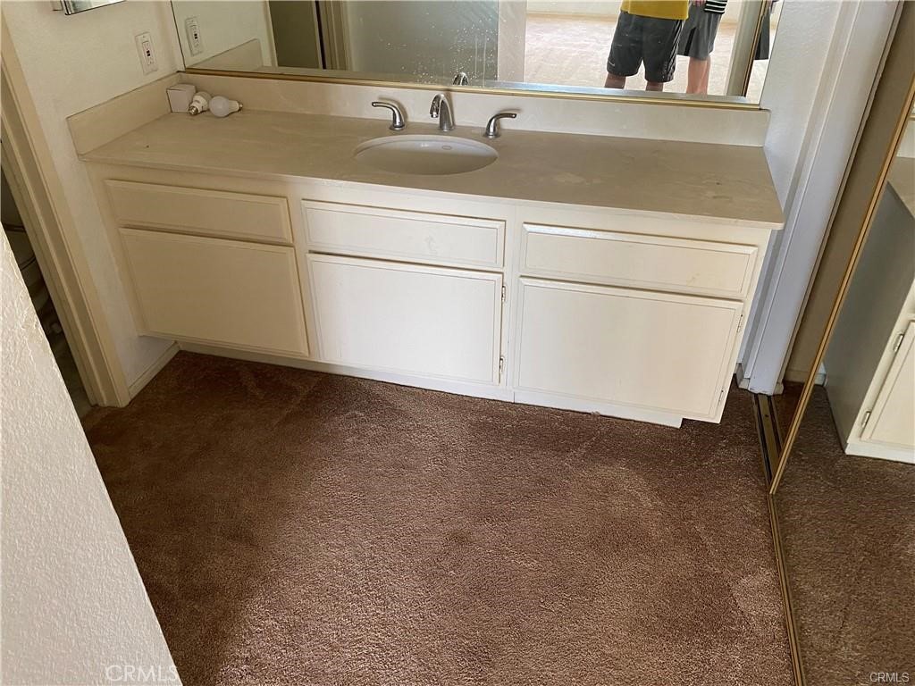 48 Exeter, Unit 1 Irvine, CA 92612 - Photo 9 of 15 a utility room with dryer and washer