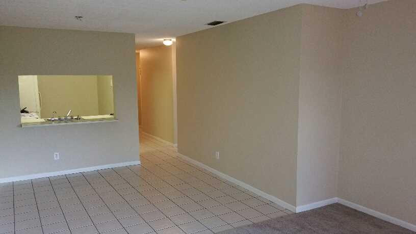 5282 Gate Lake Road, Unit 5282 Tamarac, FL 33319 - Photo 3 of 8 a view of an empty room